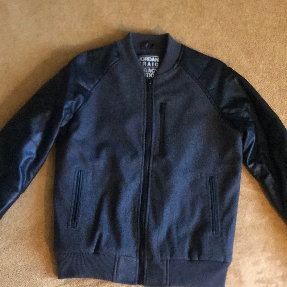 Jordan Craig Legacy Edition black and gray varsity jacket